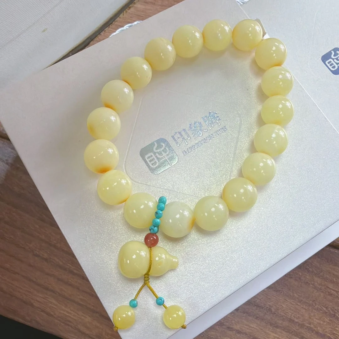 【产品部专享】天然琥珀蜜蜡圆珠手串手持约11mm多样性发一cg