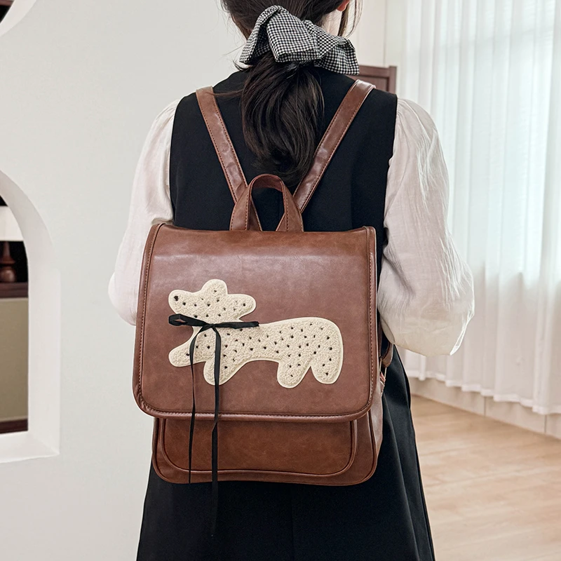 皮质可爱小狗大容量学院风大学生14寸笔记本横竖版上课装书双肩包