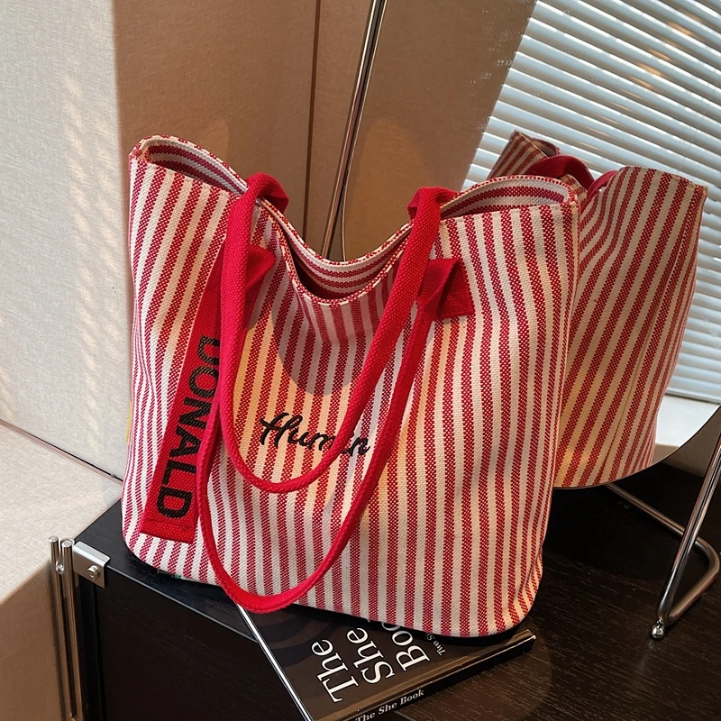 红色条纹帆布包包女2025新款休闲大容量单肩托特包结婚新娘手提袋