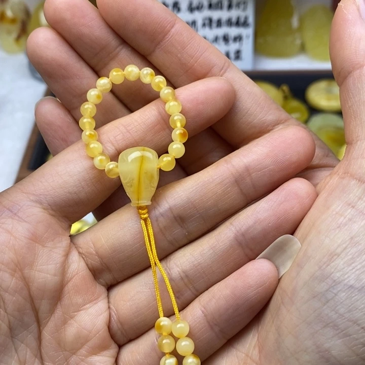 蜜蜡未镶嵌裸石三通10加，冰片纹