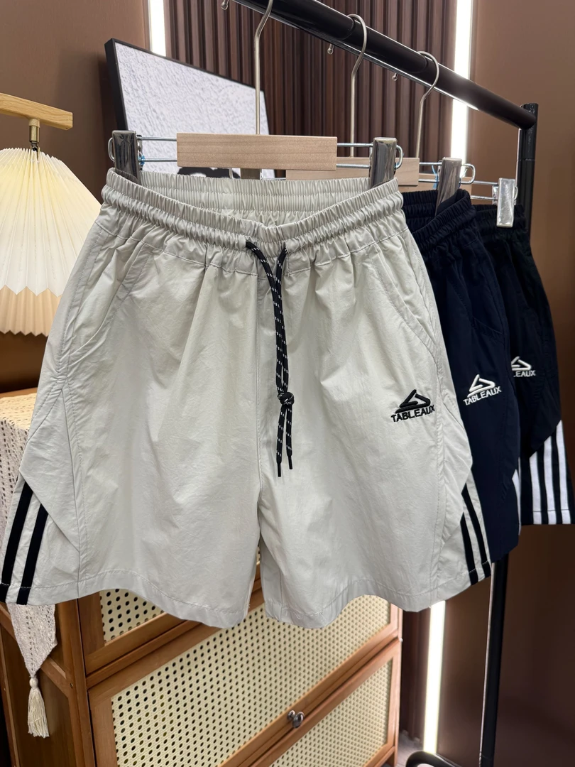 解锁夏日酷帅感~2025新款中大童三条酷感运动速干短裤00173