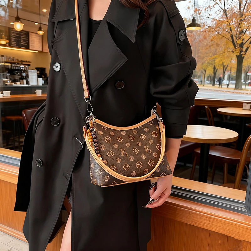 今年流行爆款包包女式2025新款超火印花腋下托特包百搭单肩斜挎包