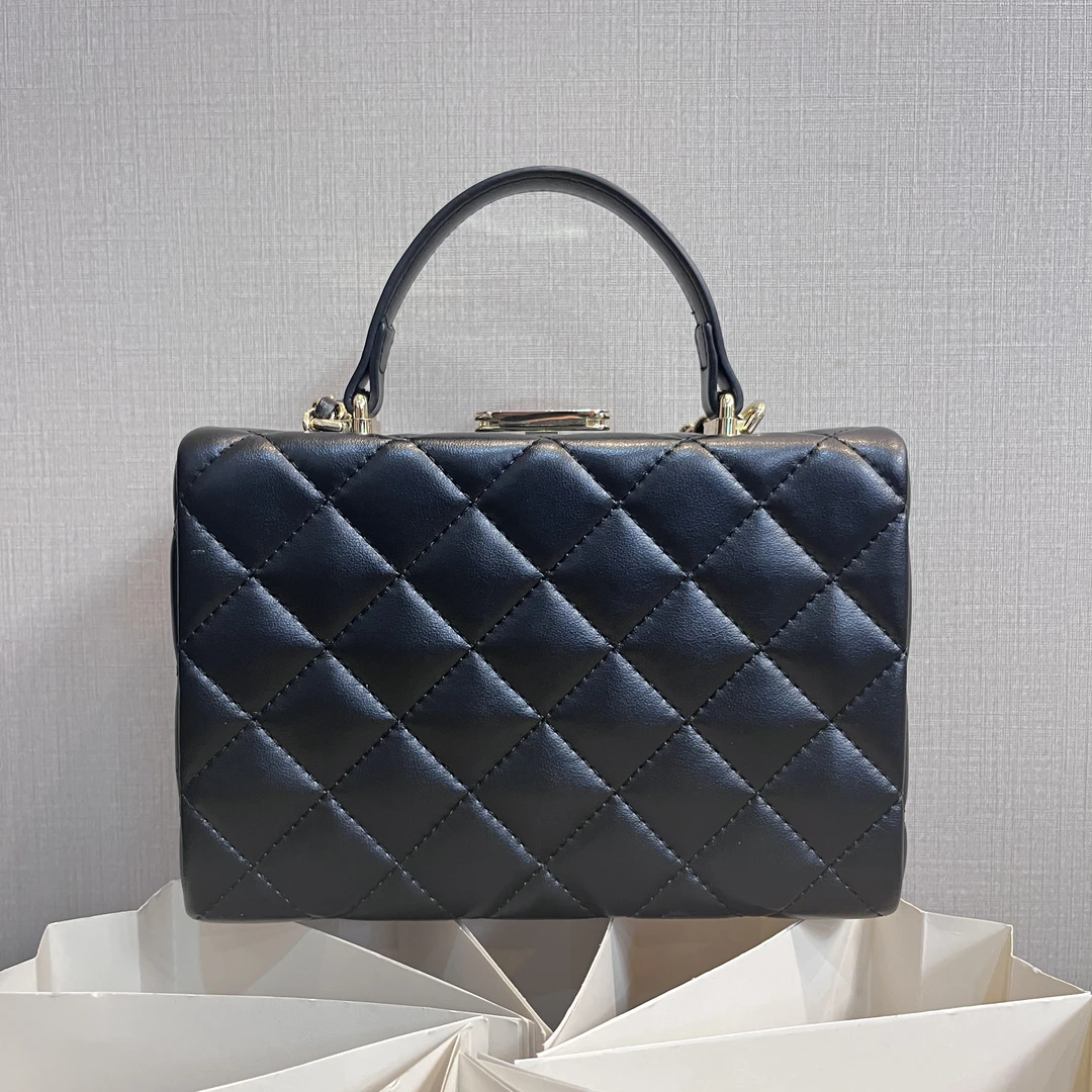 TOLEX2025新款手工时尚手提按压盒子百搭真皮女包黑色