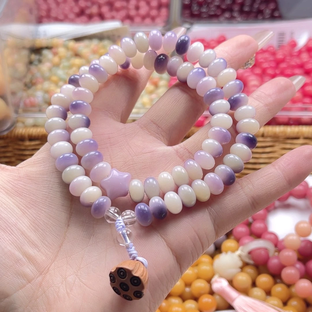 白玉菩提吊坠z9mm150颗。紫飘算盘