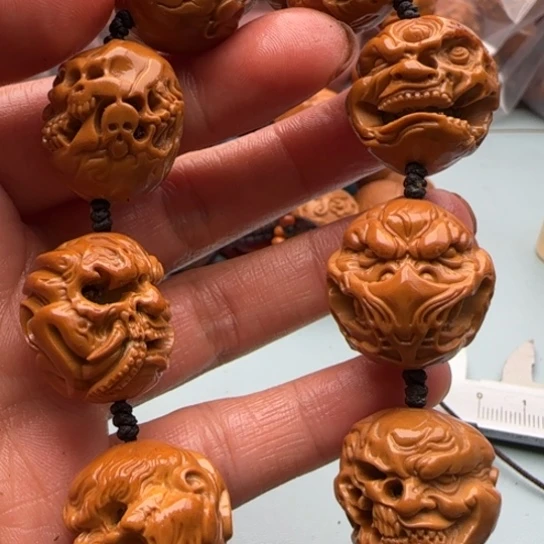 橄榄核手串雕刻工艺