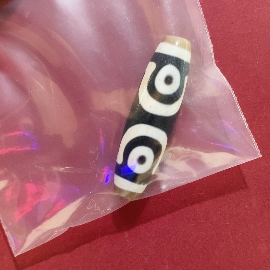 熬***姨玛瑙/玉髓颈饰合金行运三眼