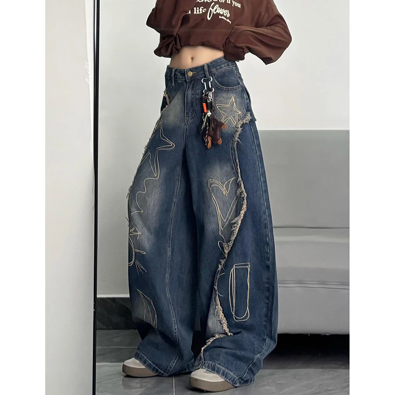 300斤美式水洗毛边刺绣阔腿牛仔裤女大码胖mm高腰设计感做旧裤子