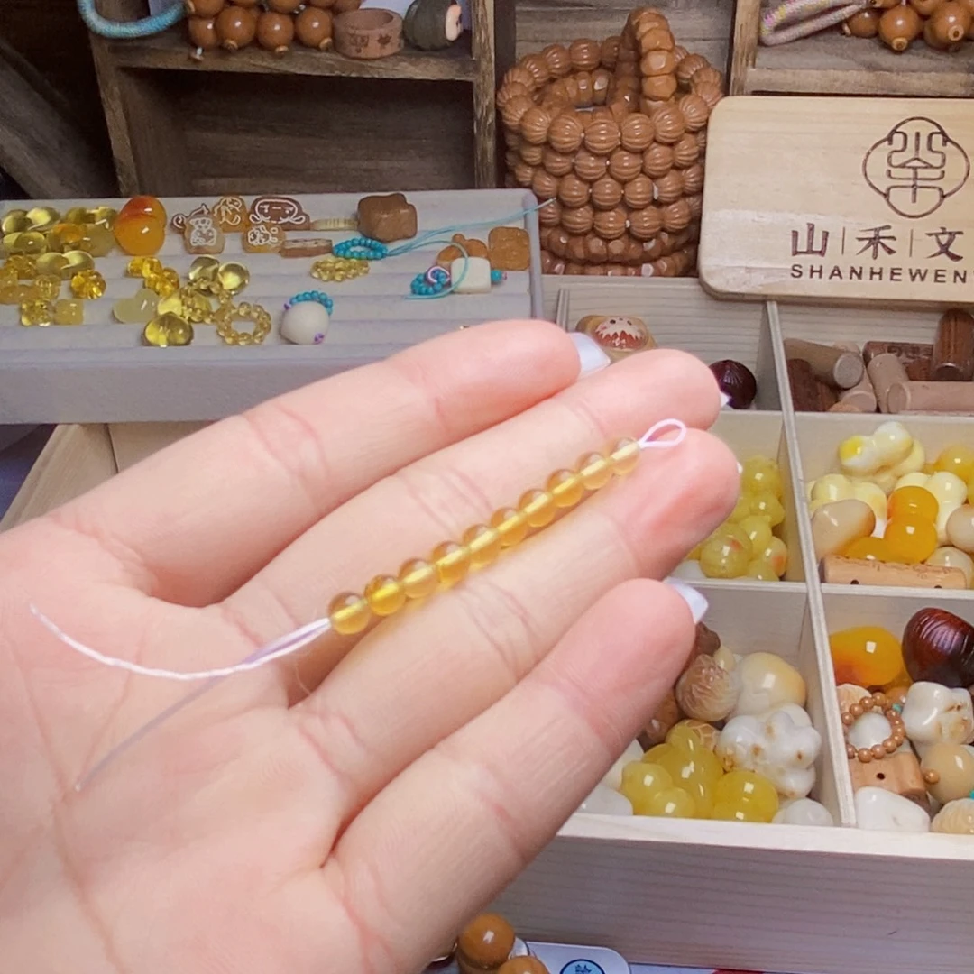 金***比吊坠猴头核桃蜜卡