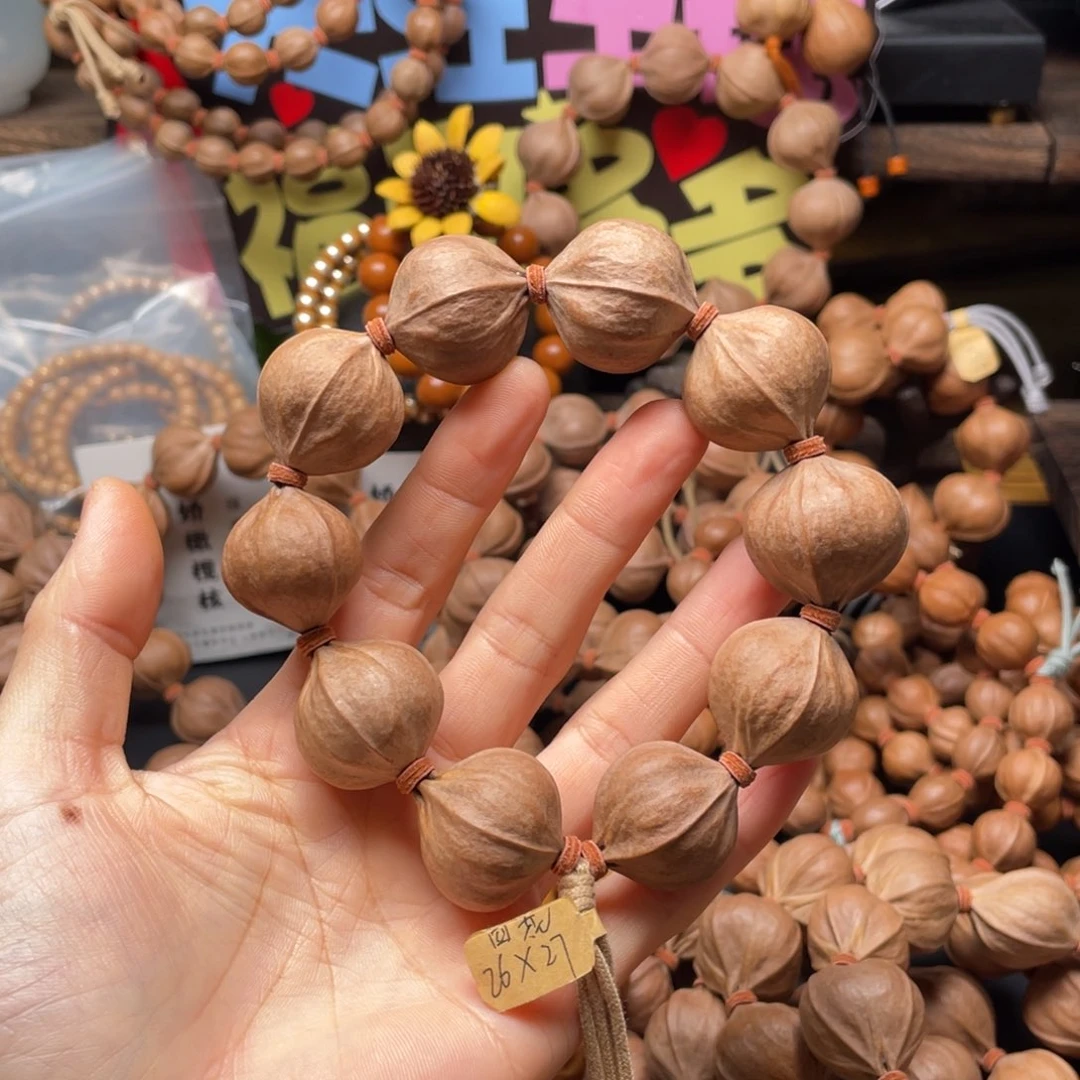 供***购橄榄核吊坠2627四花铁核