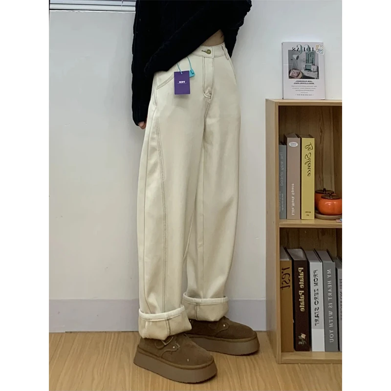 浅杏色弯刀牛仔裤女2025春季新款高腰遮跨显瘦宽松显瘦设计感裤子