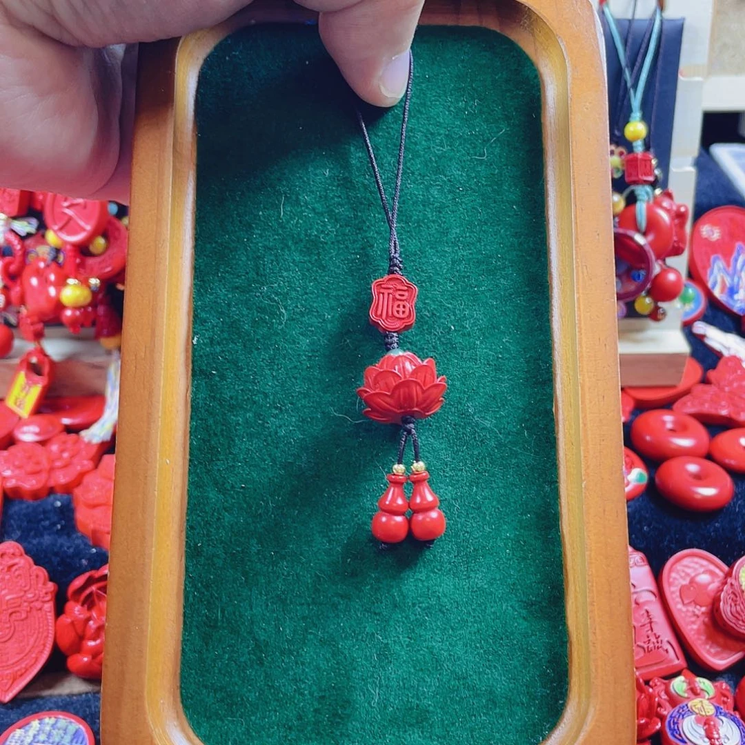 A***1天然辰砂含辰砂工艺品莲花手机坠