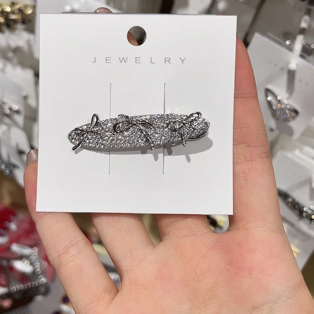 布艺非金属银色蝴蝶结鸭架