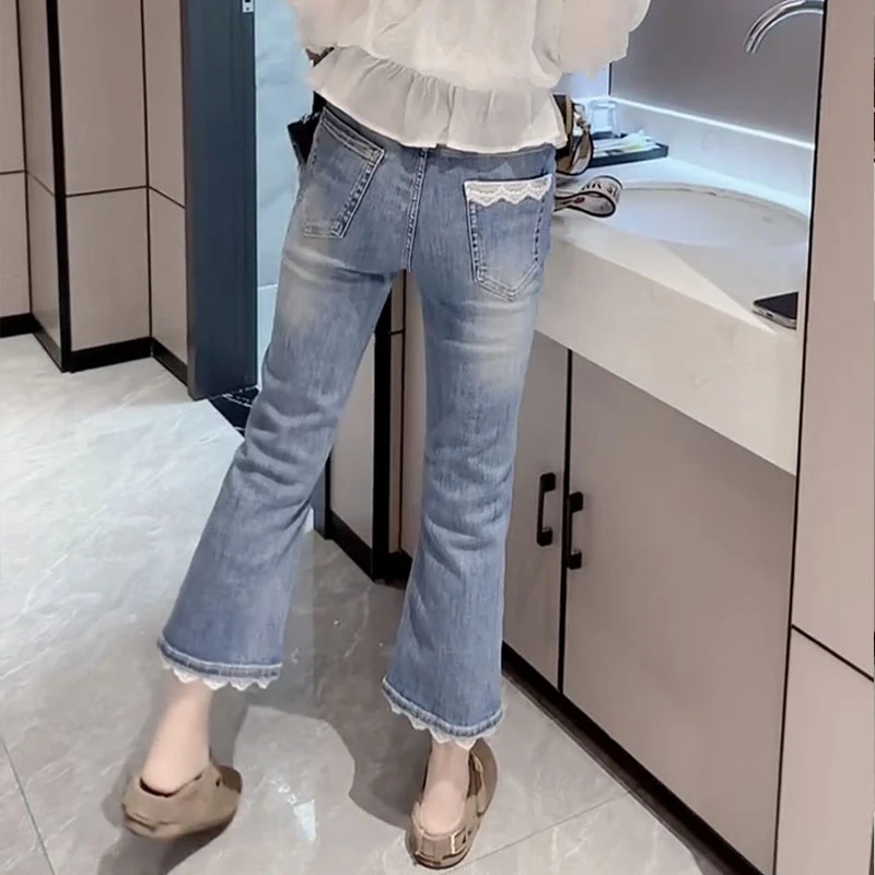 弹力牛仔裤女2025新款夏季显瘦蕾丝拼接九分马蹄裤大码遮肉微辣裤