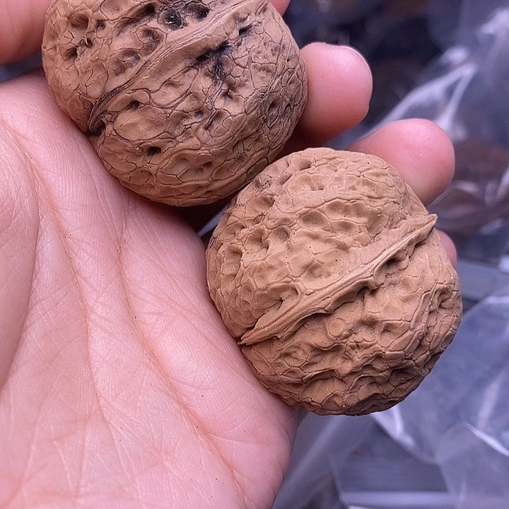 王***℡文玩核桃把件   163