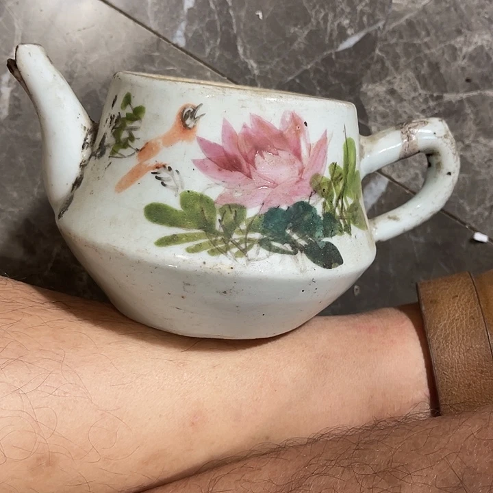 罐粉彩茶壶有残了的