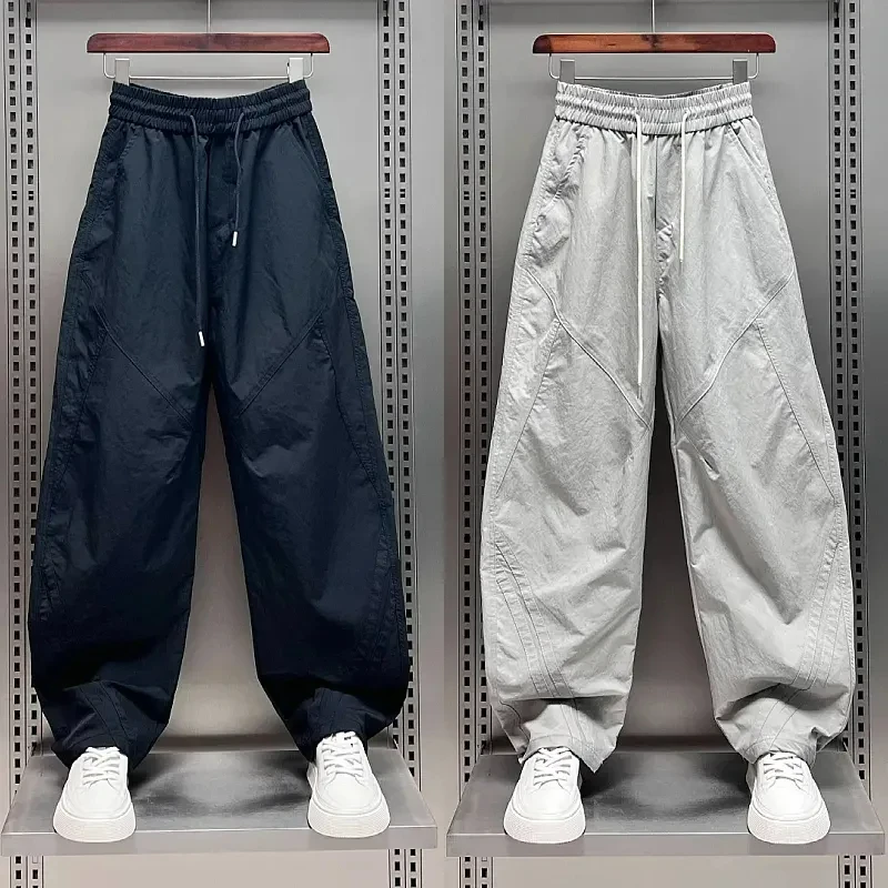 2025年秋冬加绒男士拼条休闲裤宽松百搭哈伦裤时尚潮流阔腿直筒裤
