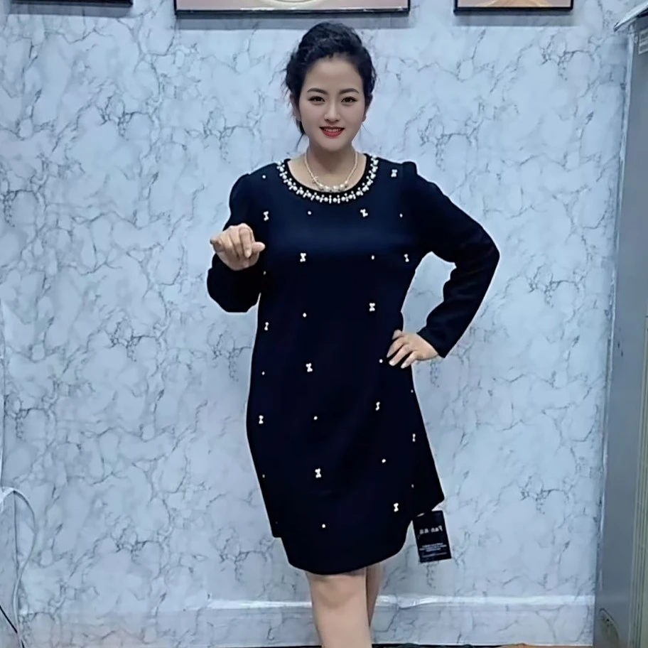 秋季时尚圆领钉珠宽松百搭中长连衣裙