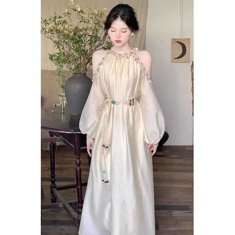 法式简约花边浅杏色连衣裙女秋季新款百搭波西米亚度假风茶歇长裙