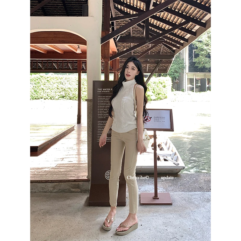 何晨曦 筷子腿浅卡其小脚牛仔裤春季复古直筒紧身显瘦长裤T0759K