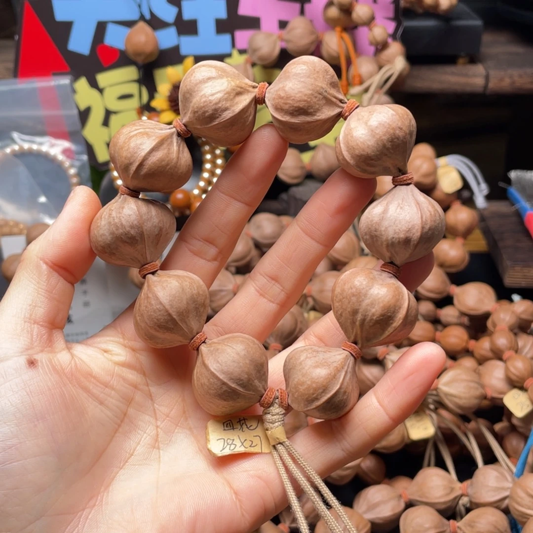 卖***伙吊坠橄榄核2827四花铁核