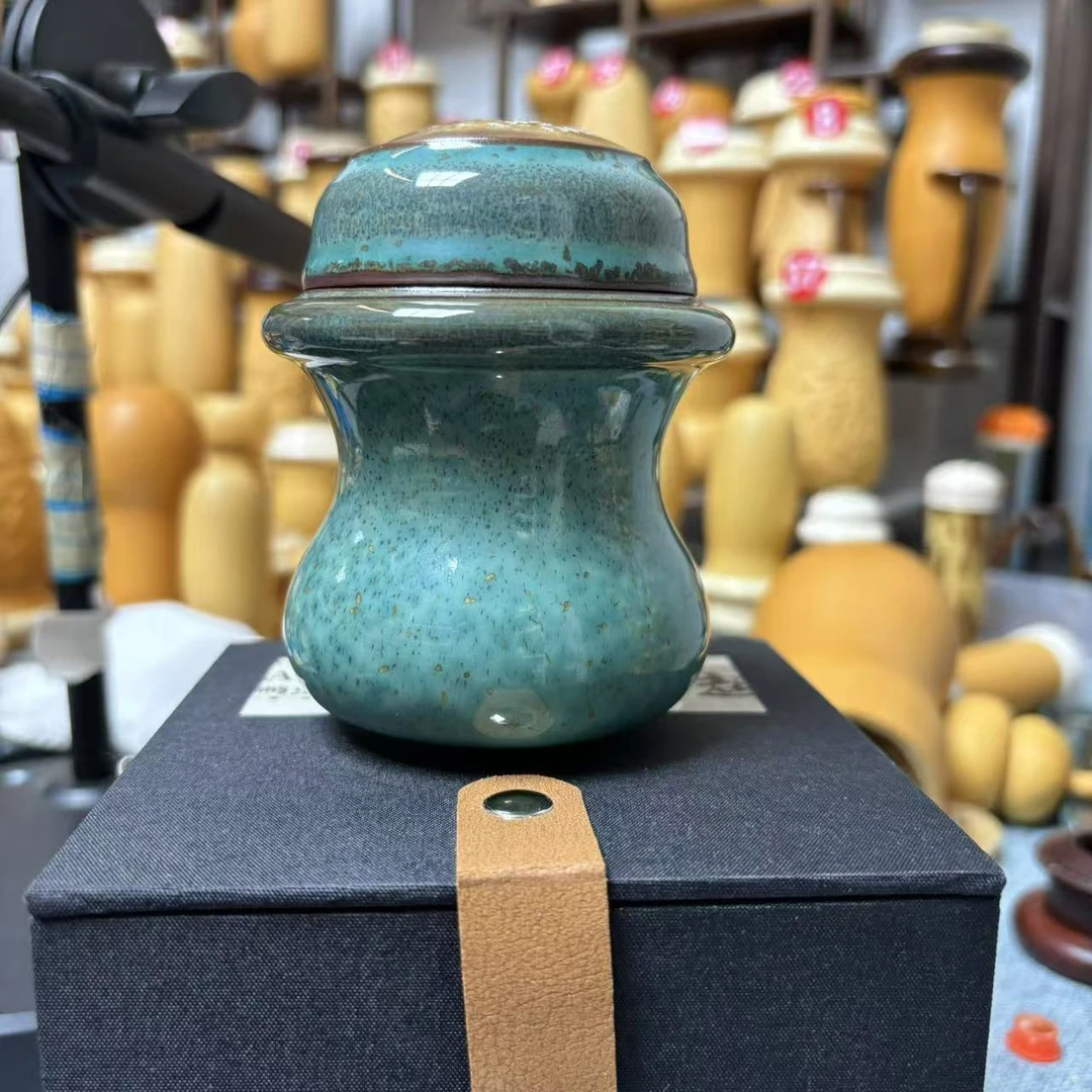 均瓷窑变釉金星空蓝.松石绿叫罐