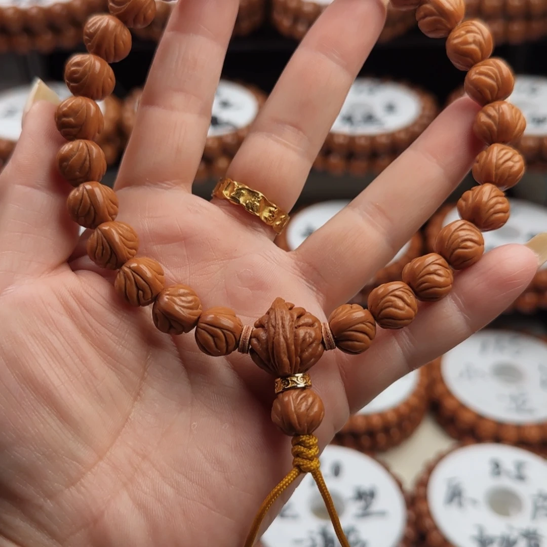 桃核手串小龙包手持