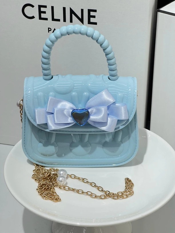 蓝色蝴蝶结爱心包包包夹子