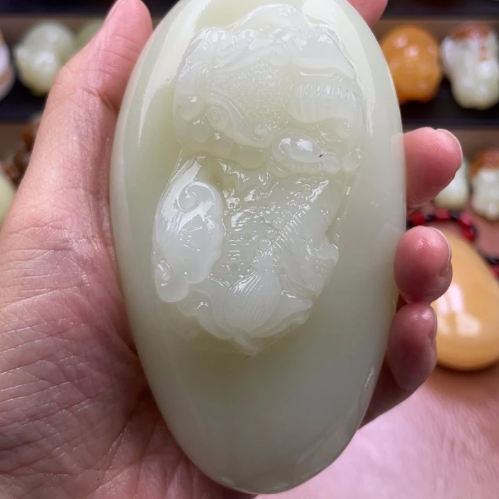 沭***柴石材古青石手把件