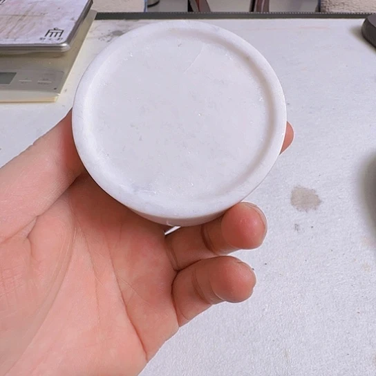 陈**.圆形白端一方砚台郁墨