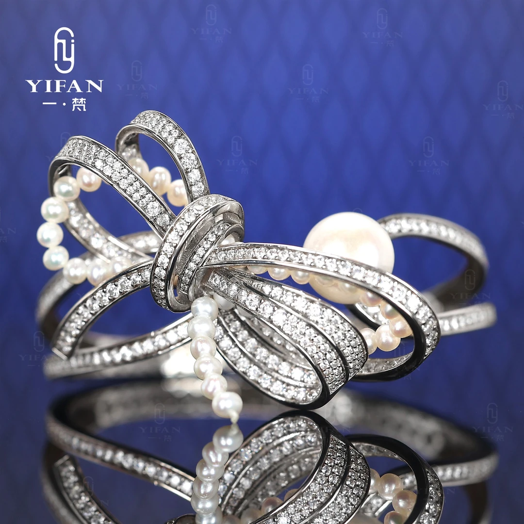 925银合成锆石手链 蝴蝶结白珠手镯