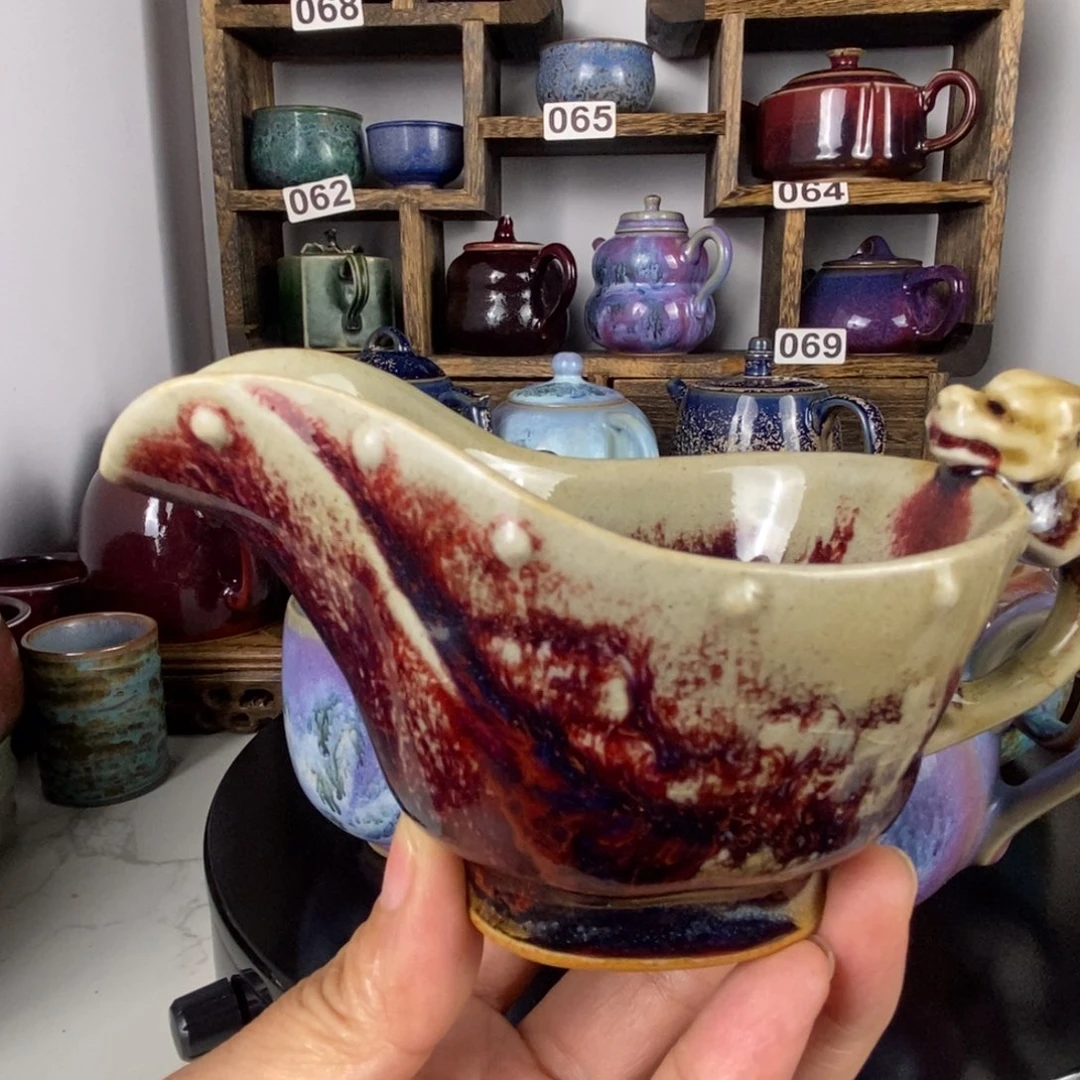 谢***E中国神后钧瓷茶具处理