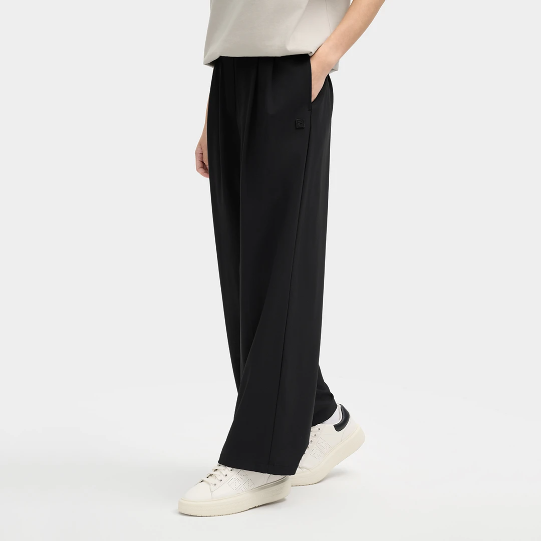 FILA/斐乐女装休闲运动舒适透气户外时尚休闲梭织长裤F11W515801F