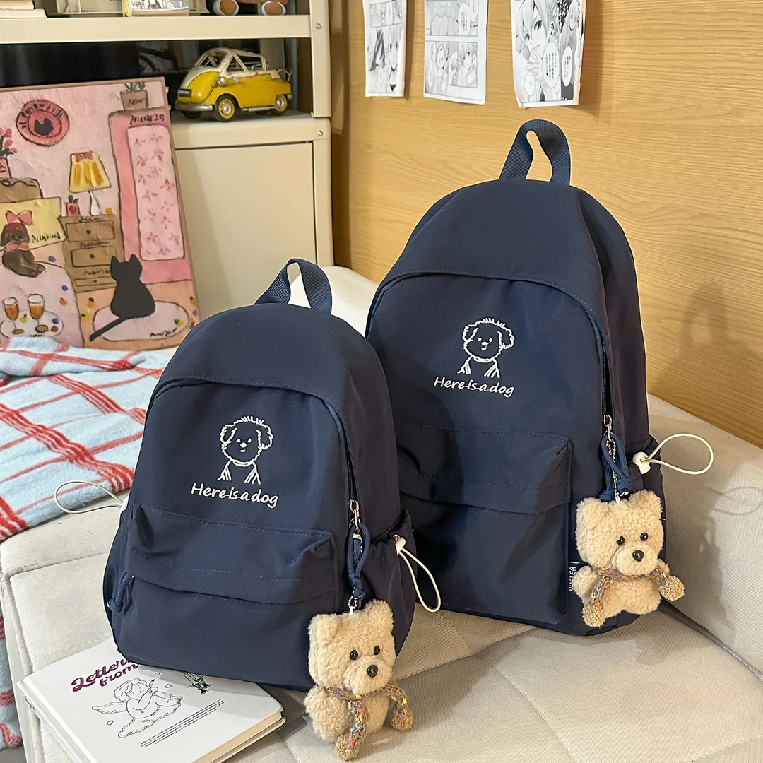 可爱刺绣小狗双肩包简约纯色百搭学生上课书包女轻便旅游小背包男