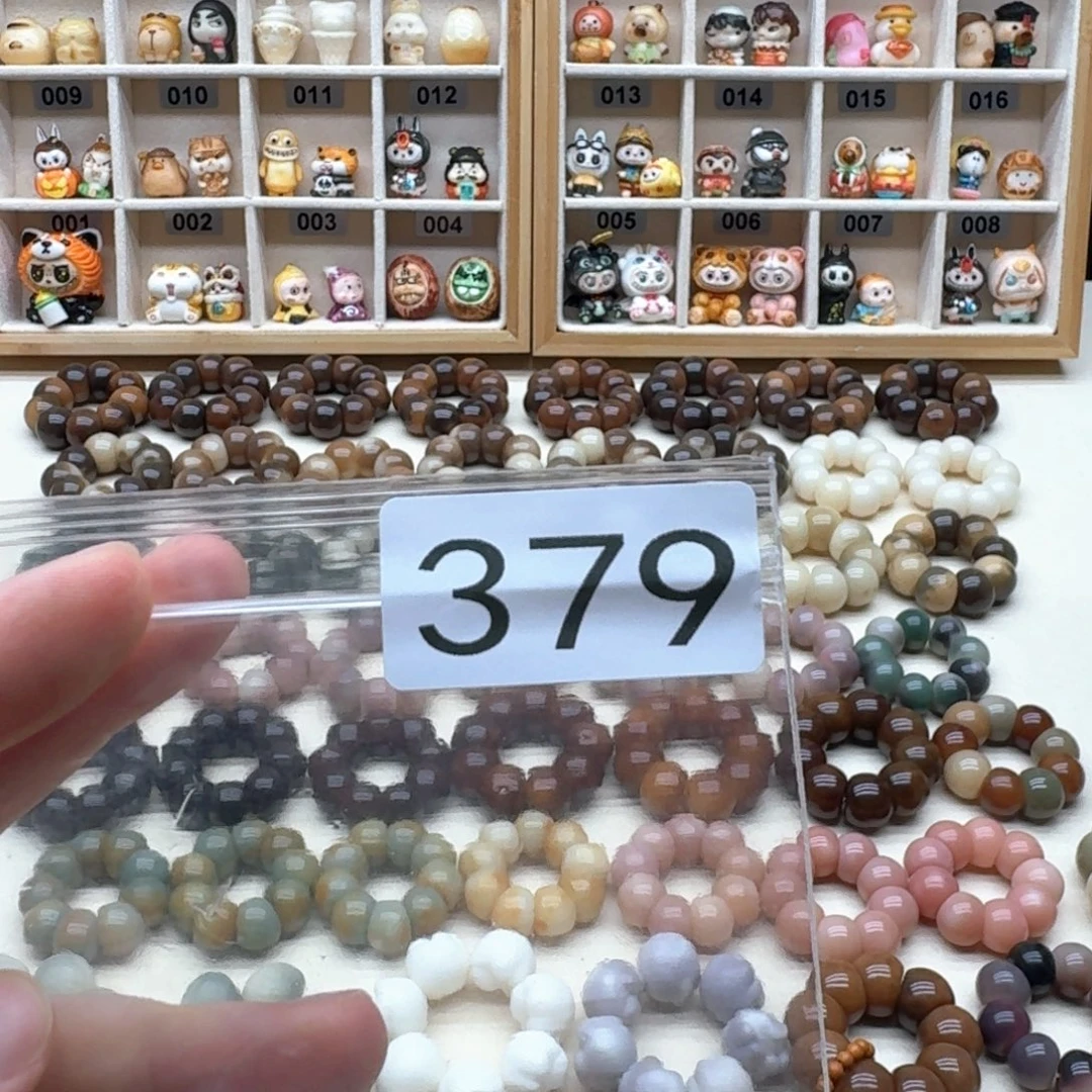 郑***诶吊坠菩提根/象牙果