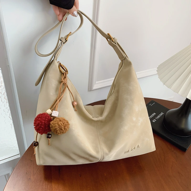 高级感磨砂腋下包包女2025新休闲单肩包秋冬爆款斜挎大包小包饺子