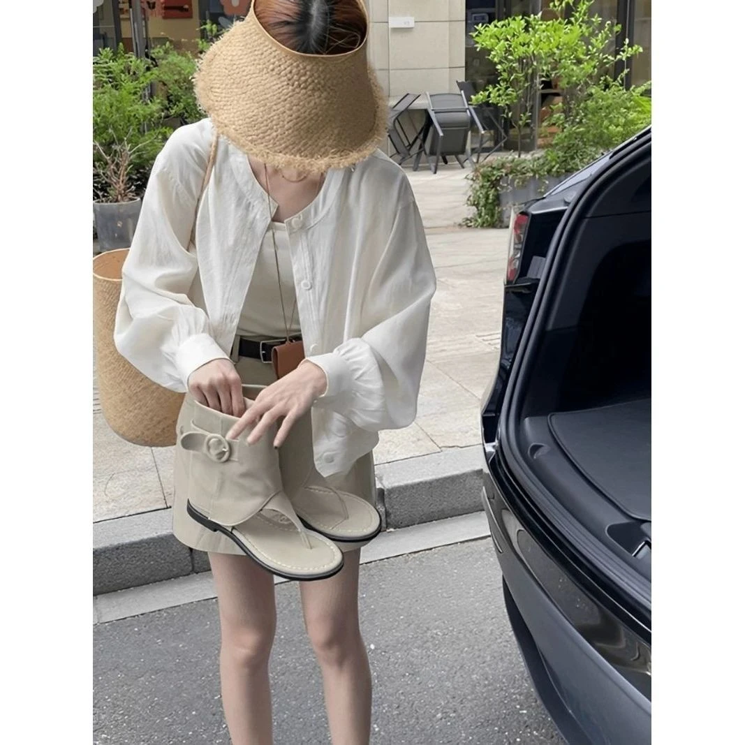 白色防晒衬衫女士外搭夏季新款日系时尚气质短款开衫上衣薄款外套