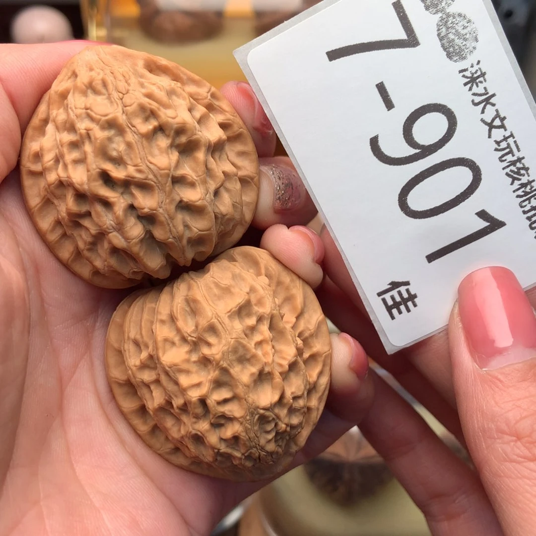 文玩核桃把件40金牛