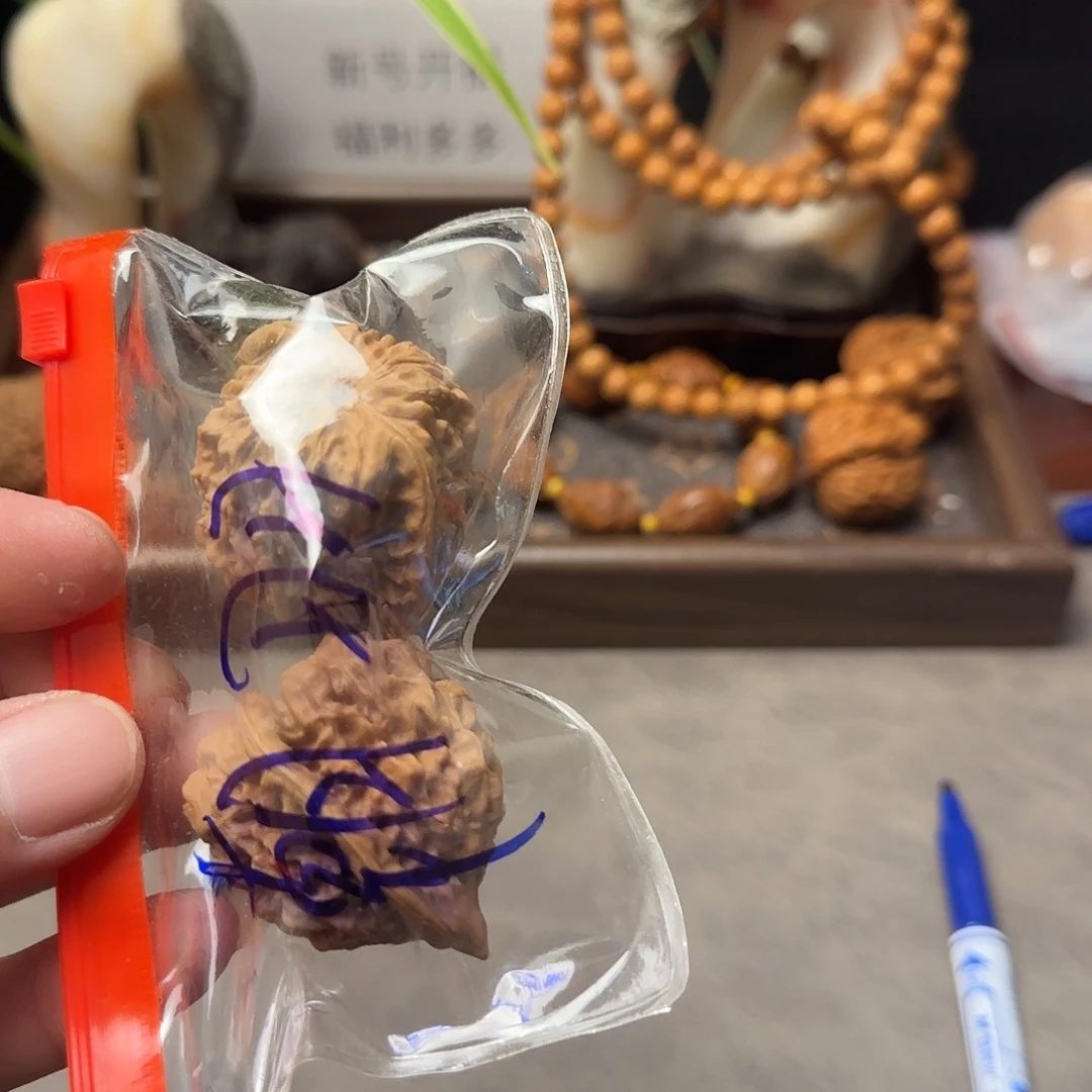 S***羽文玩核桃吊坠管帽