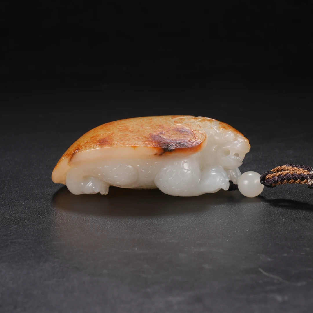 lot62新疆和田籽儿龙头龟把件（蒋永保）/保利拍卖