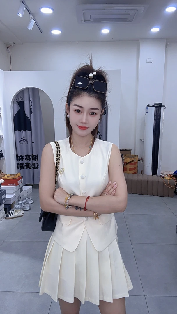 炫彩阁6611【无袖气质款时尚百褶裙套装】