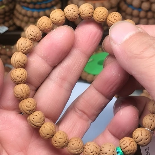 ****升桃核手串野生桃核手持27粒