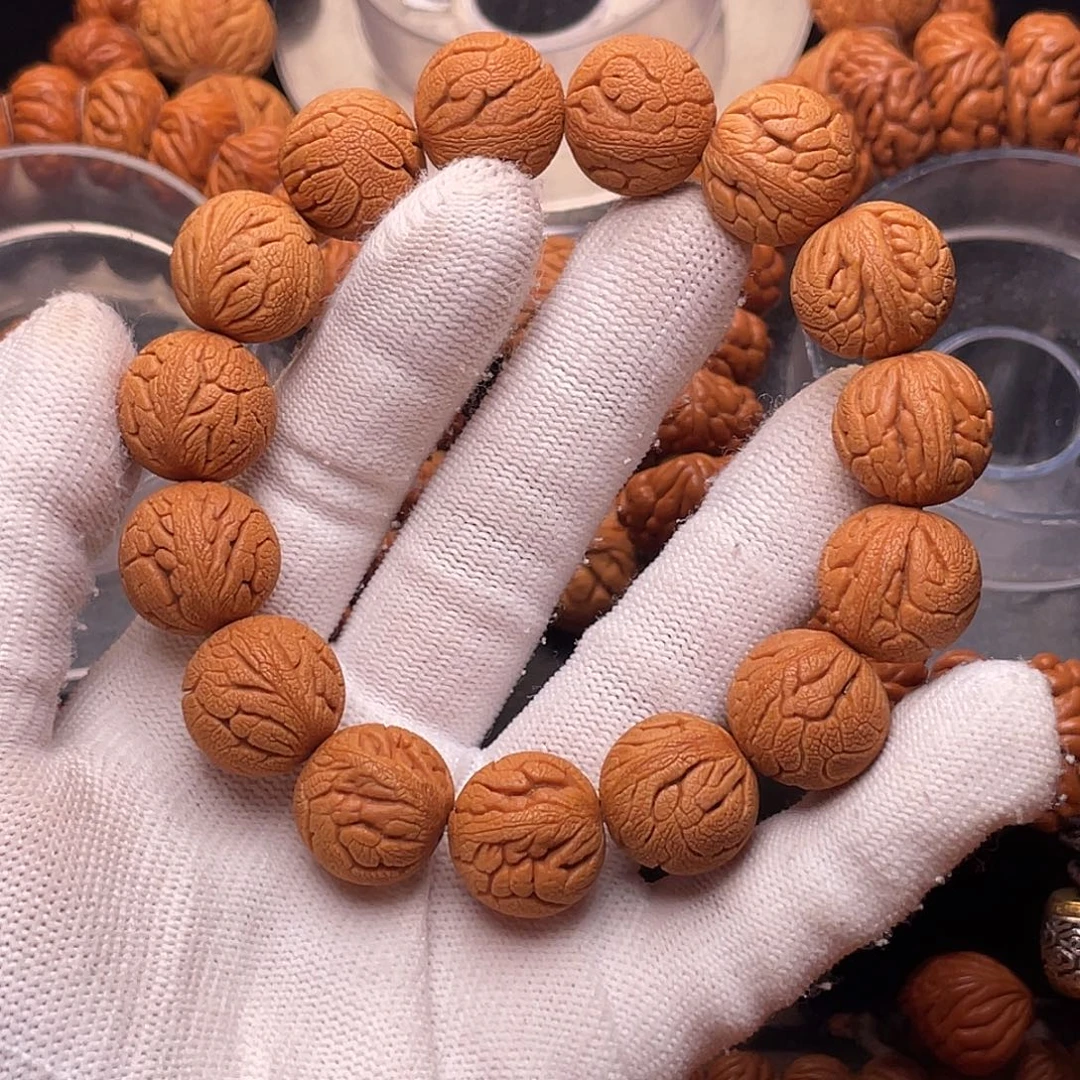 手串桃核金丝龙珠1.7