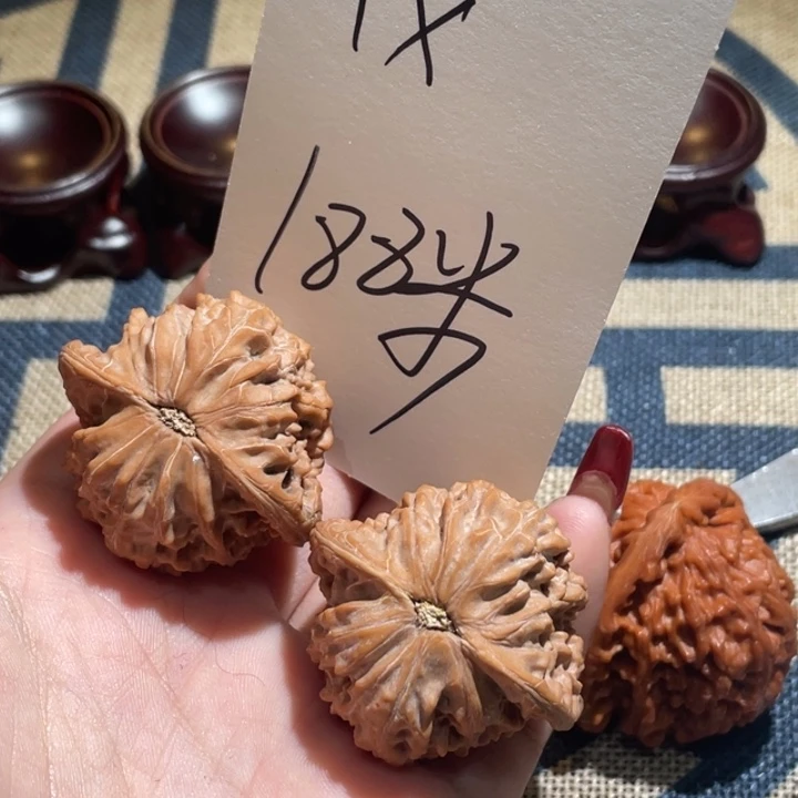 1***.文玩核桃吊坠磨盘