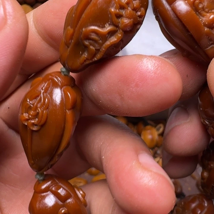 橄榄核手串你的电话