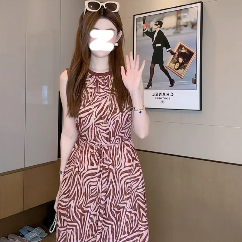 法式高端不规则花纹连衣裙女2025年夏季新款高腰显瘦A字过膝长裙