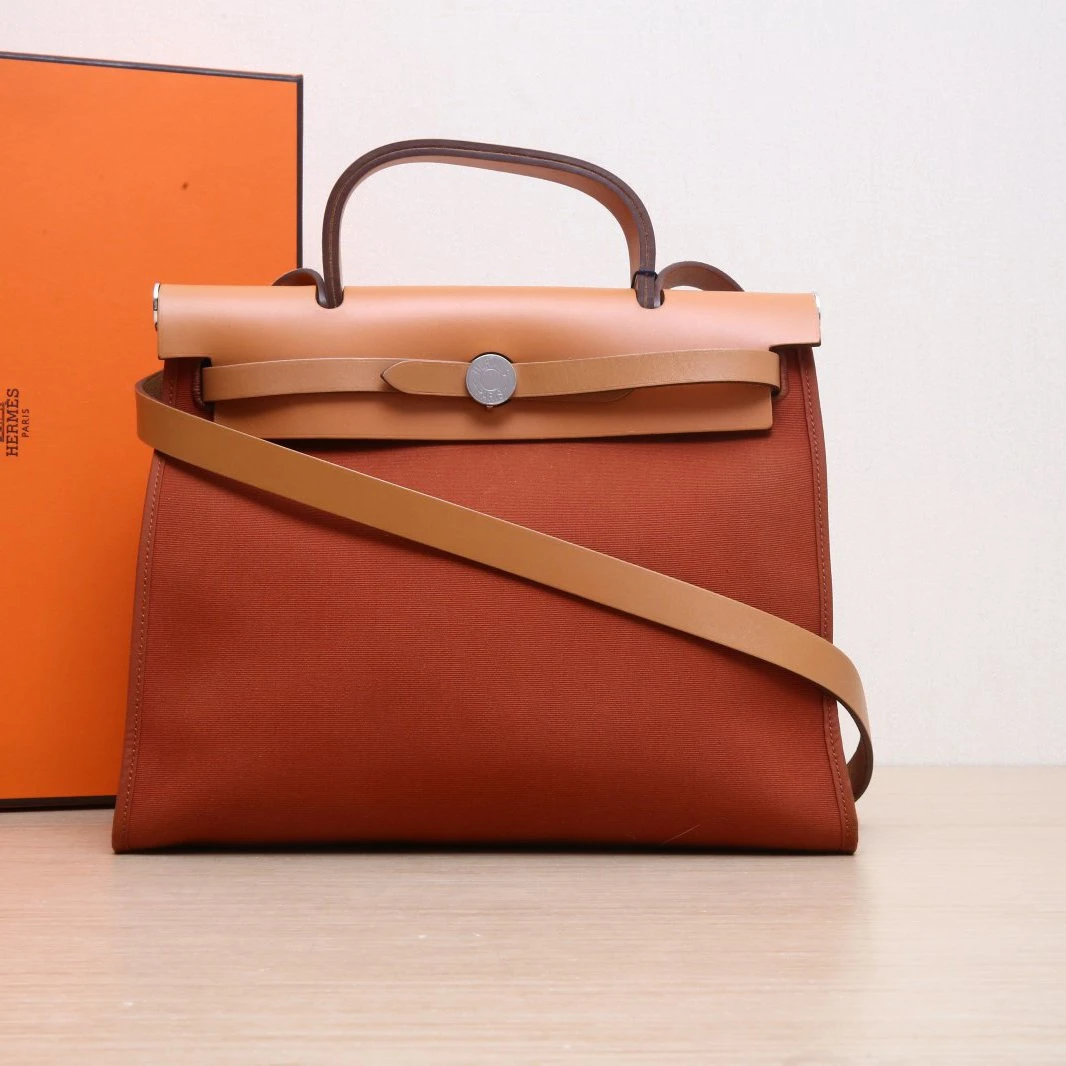 95新 Hermes/爱马仕 小花攀攀Herbag 31 R1泥土橘 帆布 A刻 银扣