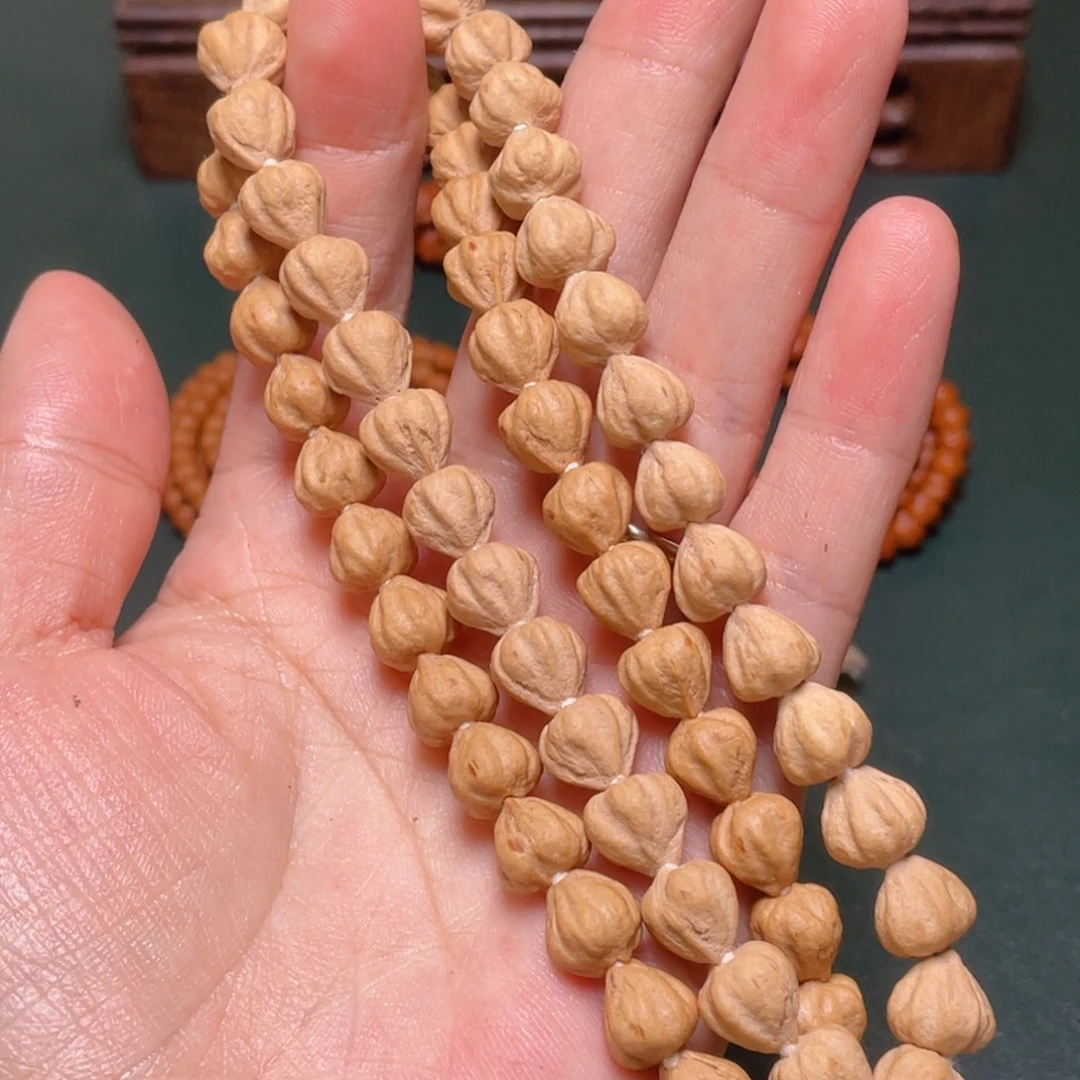 柏香籽/百香籽吊坠绝世莲花手持