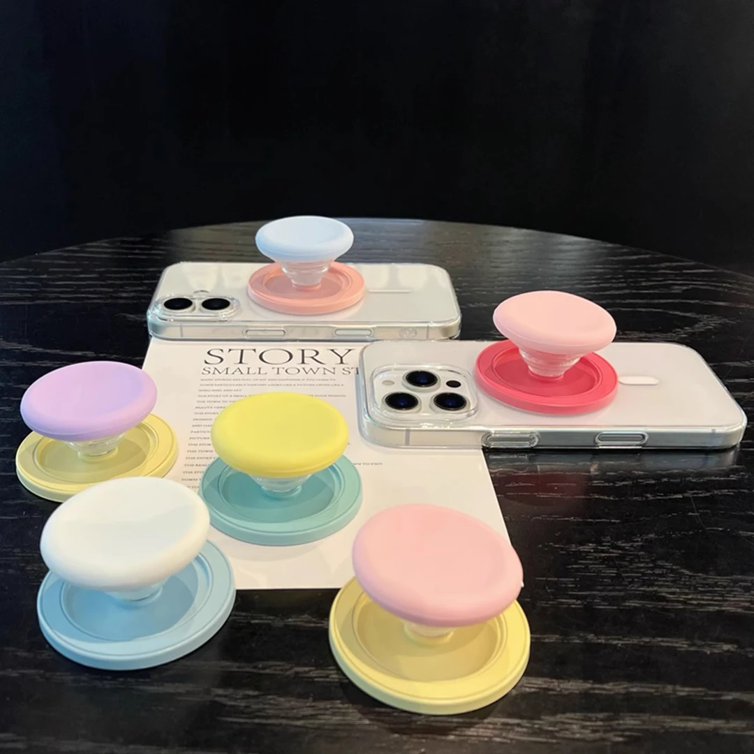 马卡龙撞色磁吸气囊手机支架吸附式背贴桌面支撑气垫可折叠伸缩