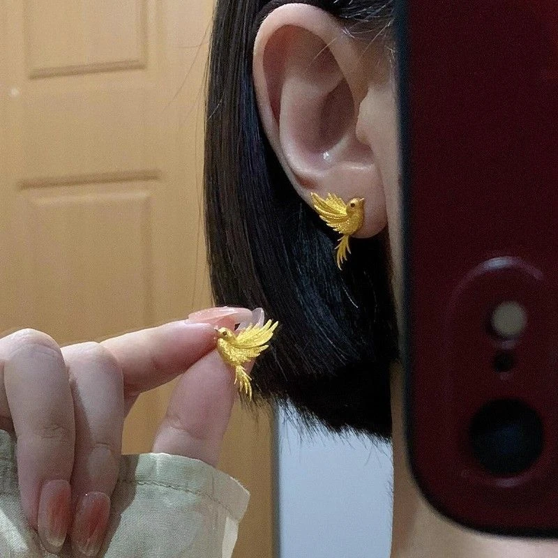合金耳饰 8449比翼双飞金色飞鸟耳钉新轻奢精致不对称耳环A444