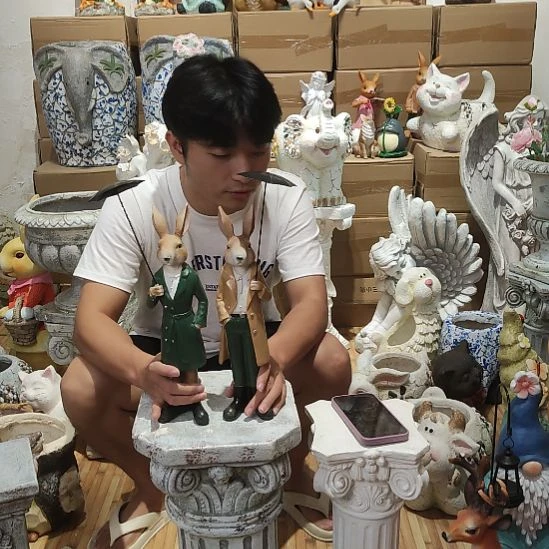 合成树脂打伞兔一对